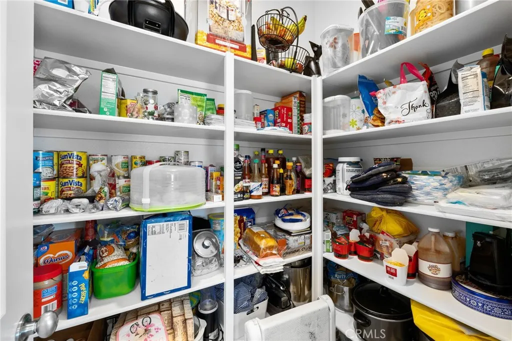 12487 Sunset Road Victorville, CA 92392 - Photo 23 of 44 a room with storage and utility