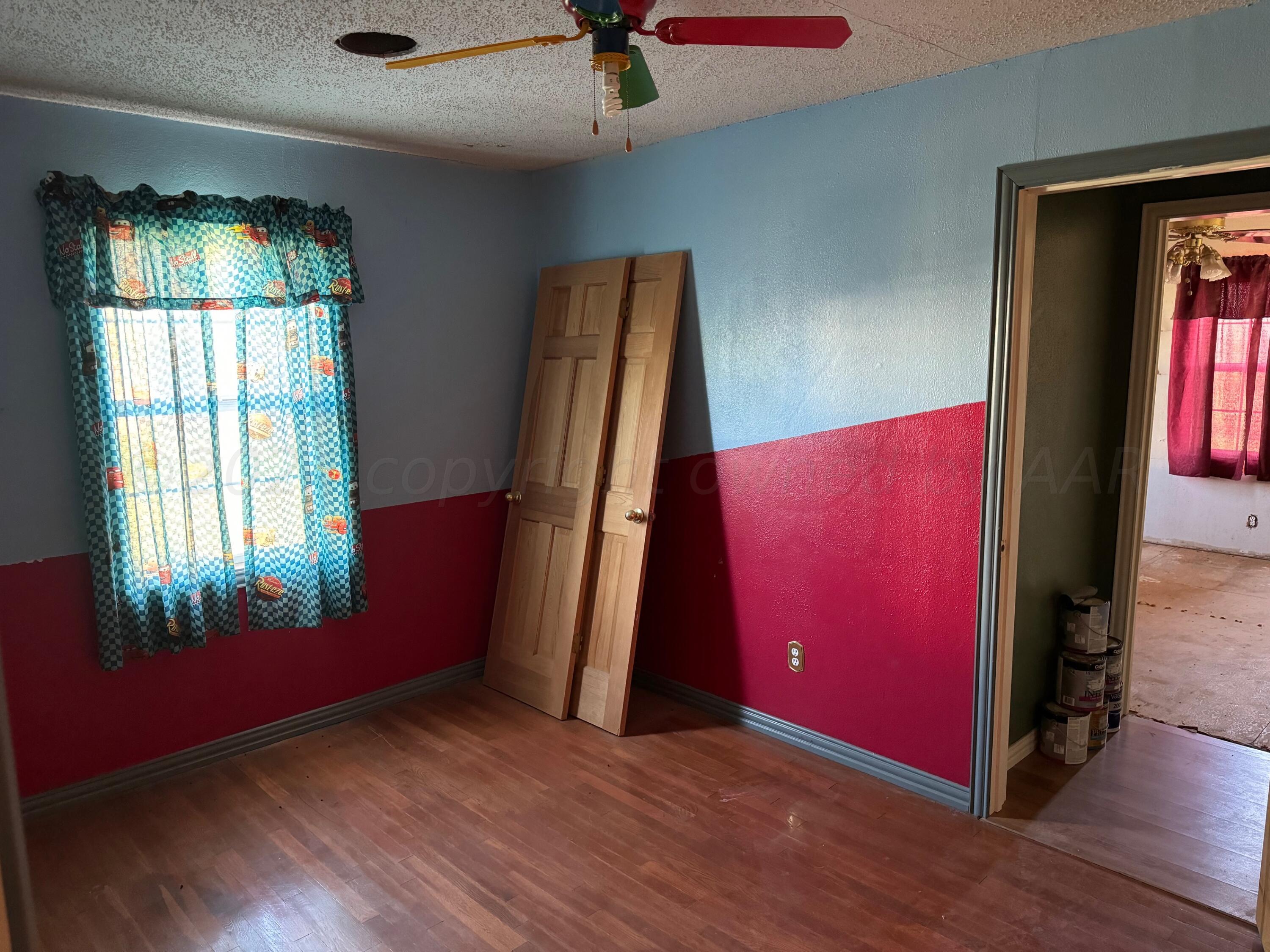 80 Chattanooga Road Amarillo, TX 79118 - Photo 12 of 33 an empty room with windows and closet