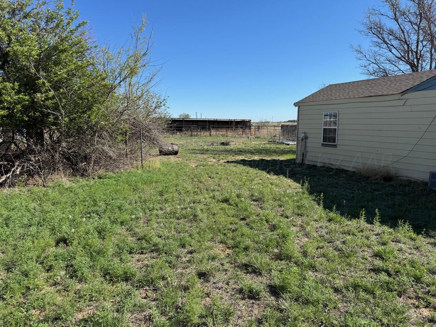 80 Chattanooga Road Amarillo, TX 79118 - Photo 17 of 33 a backyard of a house with lots of green space