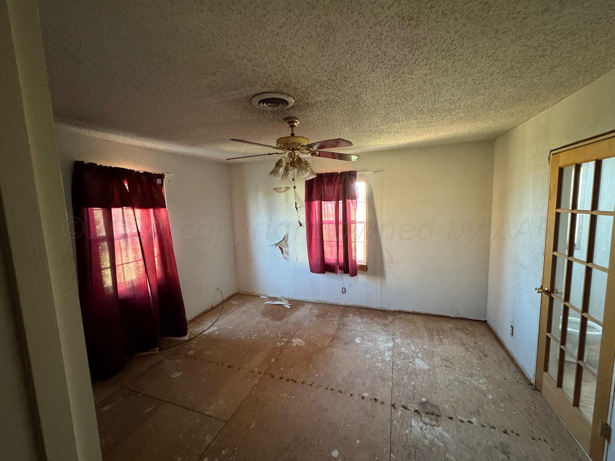 80 Chattanooga Road Amarillo, TX 79118 - Photo 7 of 33 an empty room with windows