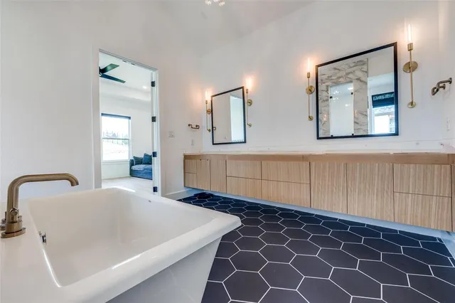a bathroom with a bathtub and a sink