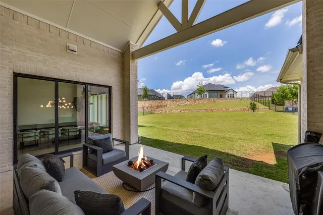 a outdoor living space with furniture and garden view