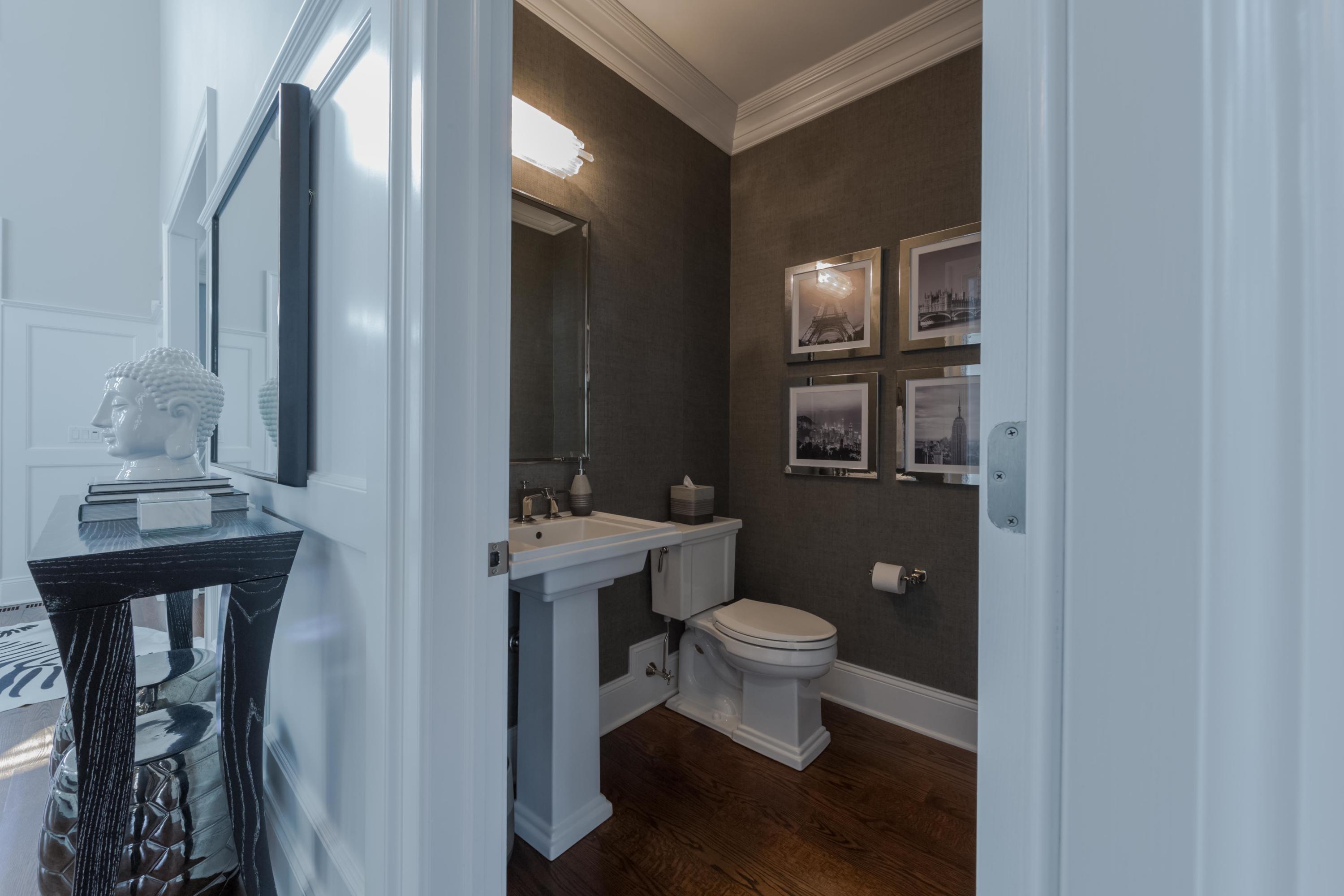 275 Middlesex Road Darien, CT 06820 - Photo 13 of 64 a bathroom with a toilet a sink and mirror