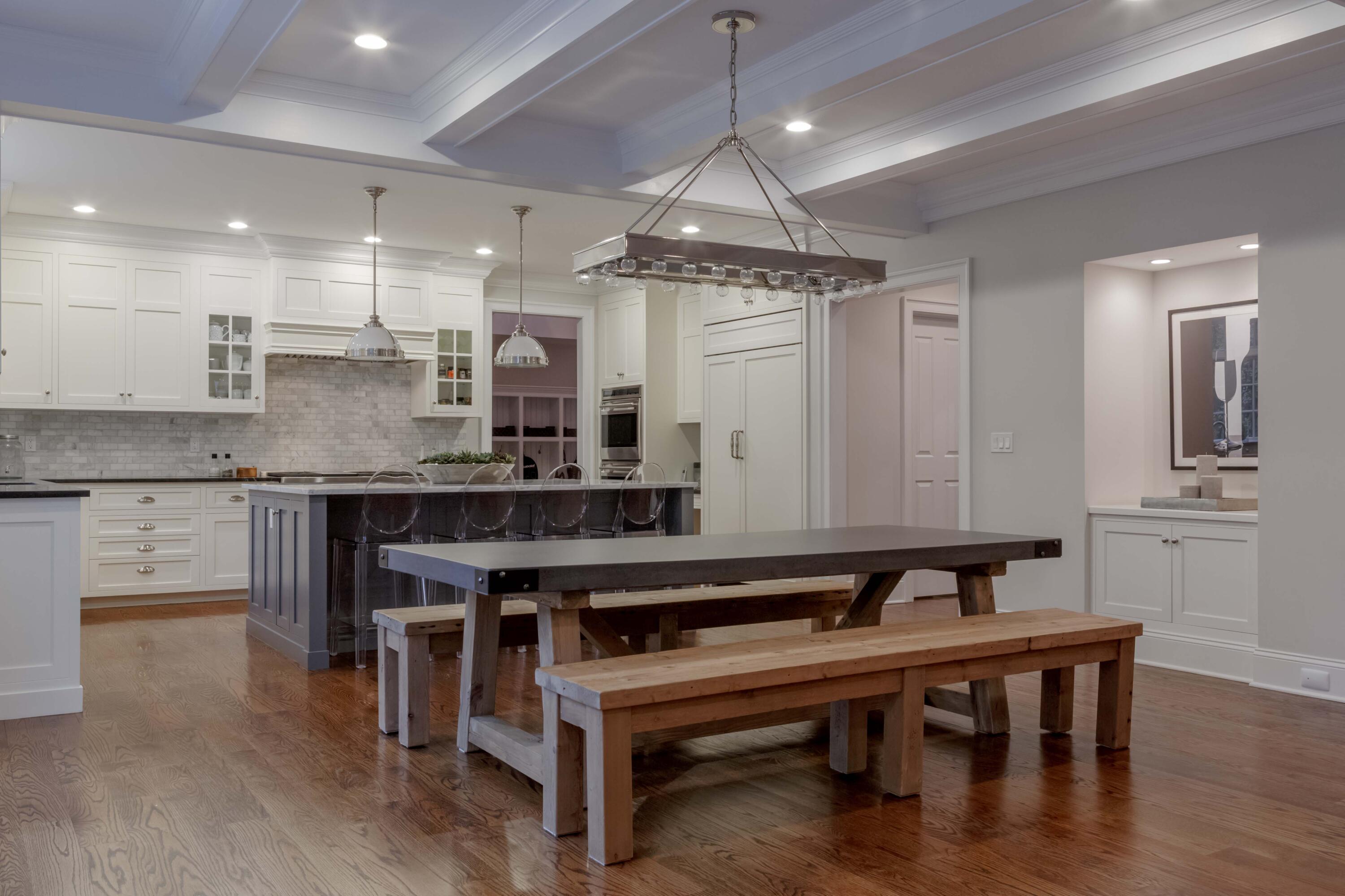 275 Middlesex Road Darien, CT 06820 - Photo 24 of 64 a kitchen with a table chairs sink and cabinets