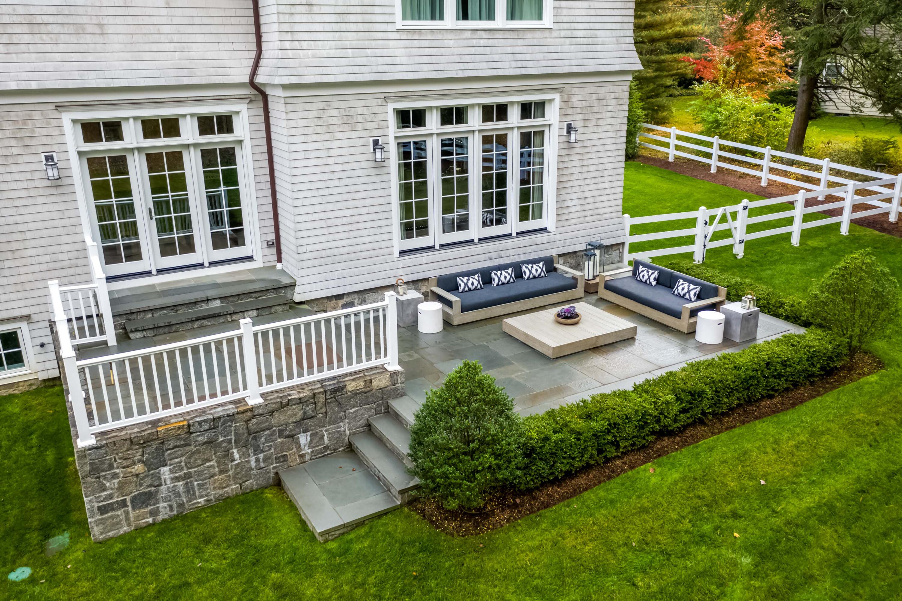 275 Middlesex Road Darien, CT 06820 - Photo 27 of 64 a front view of a house with a garden