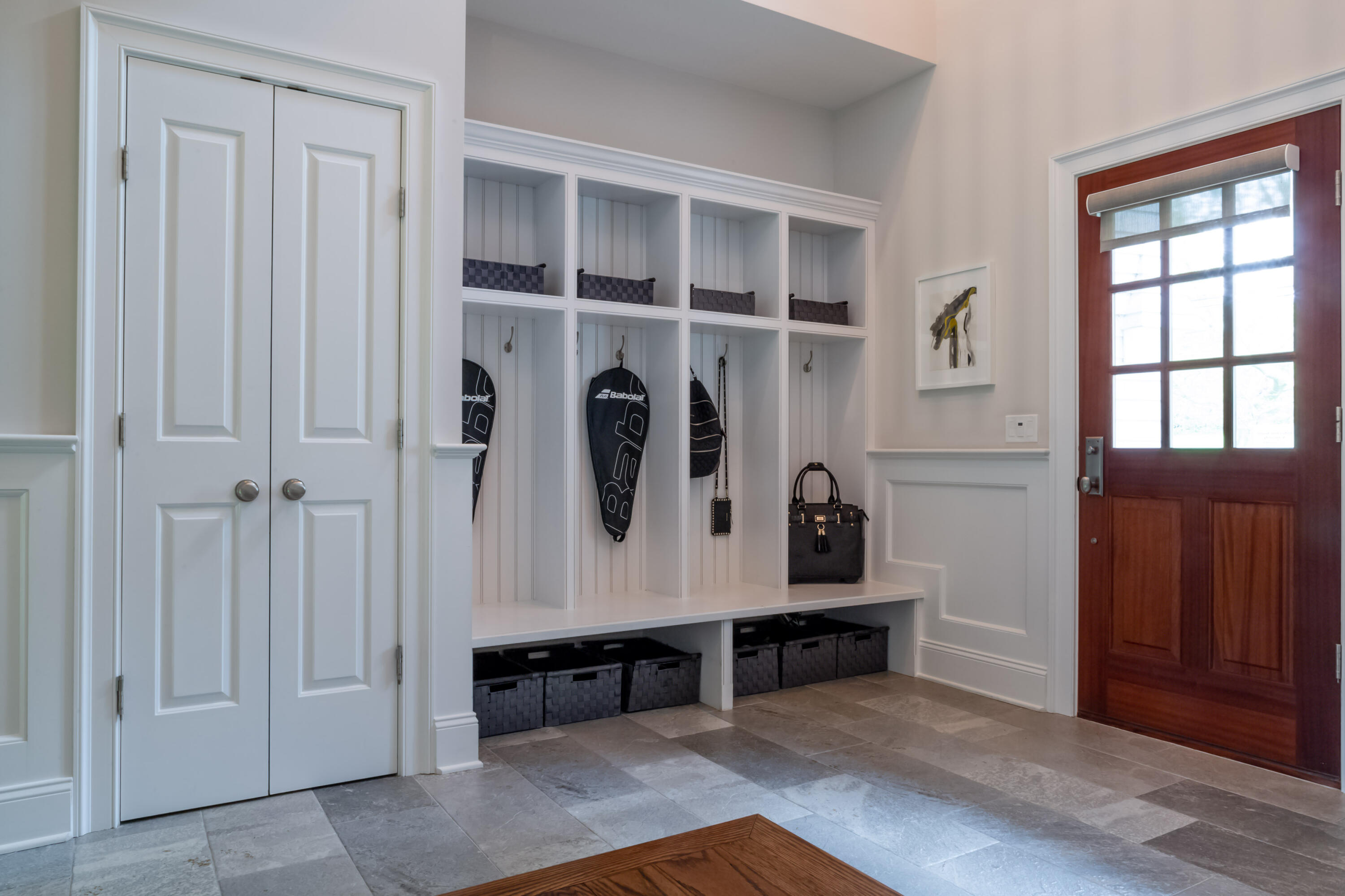 275 Middlesex Road Darien, CT 06820 - Photo 29 of 64 a view of front door with wooden floor and cabinet