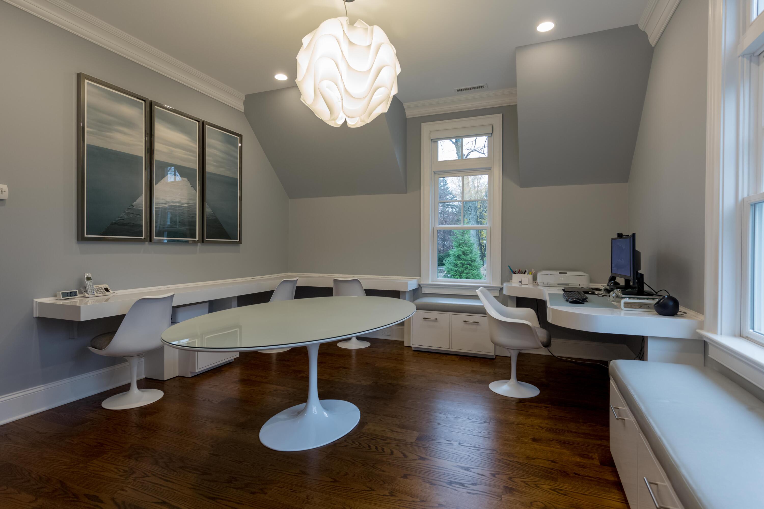 275 Middlesex Road Darien, CT 06820 - Photo 35 of 64 a view of a livingroom and dining room with wooden floor a chandelier