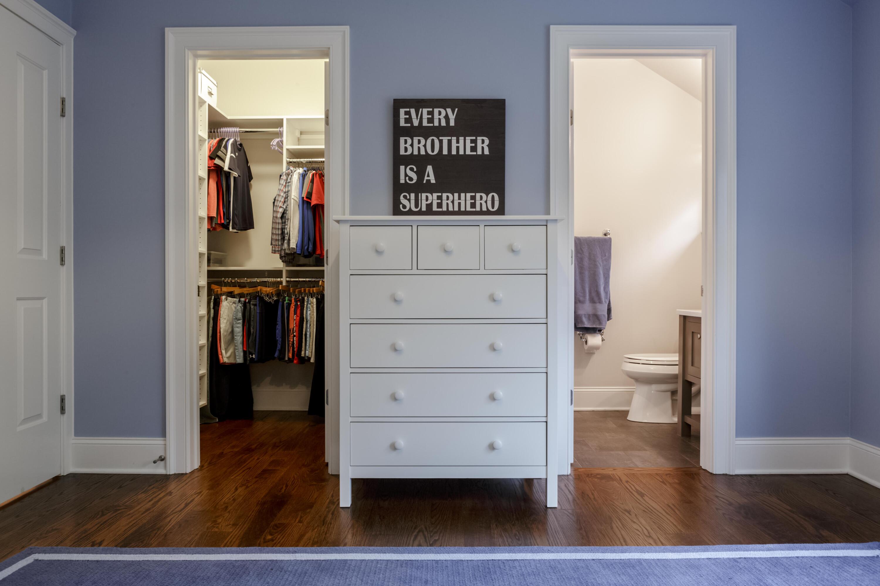 275 Middlesex Road Darien, CT 06820 - Photo 46 of 64 a view of walk in closet with clothes and shoes
