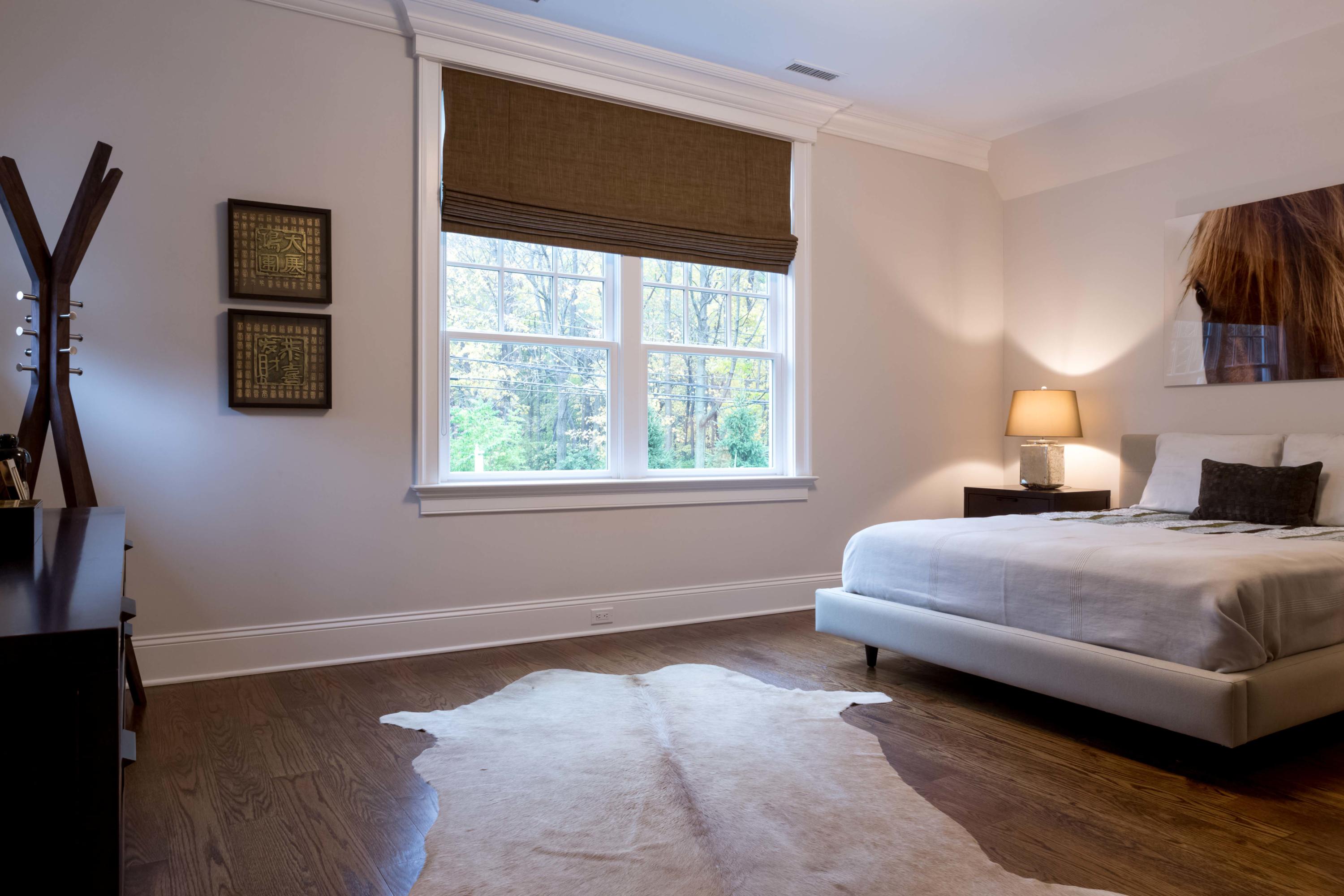 275 Middlesex Road Darien, CT 06820 - Photo 48 of 64 a bedroom with a bed and window