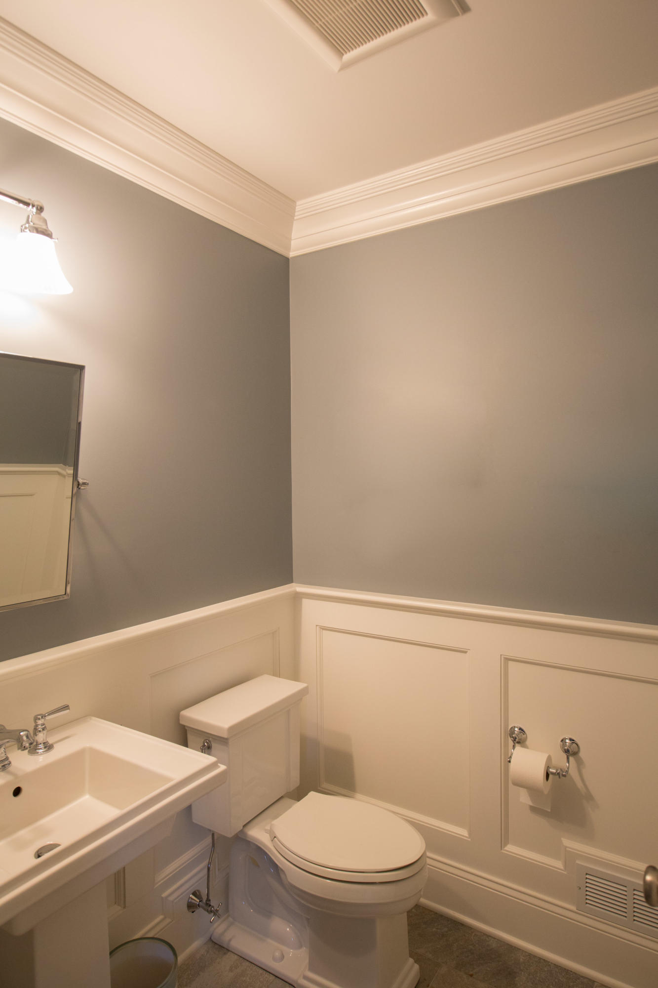 275 Middlesex Road Darien, CT 06820 - Photo 50 of 64 a white toilet sitting next to a bathroom sink