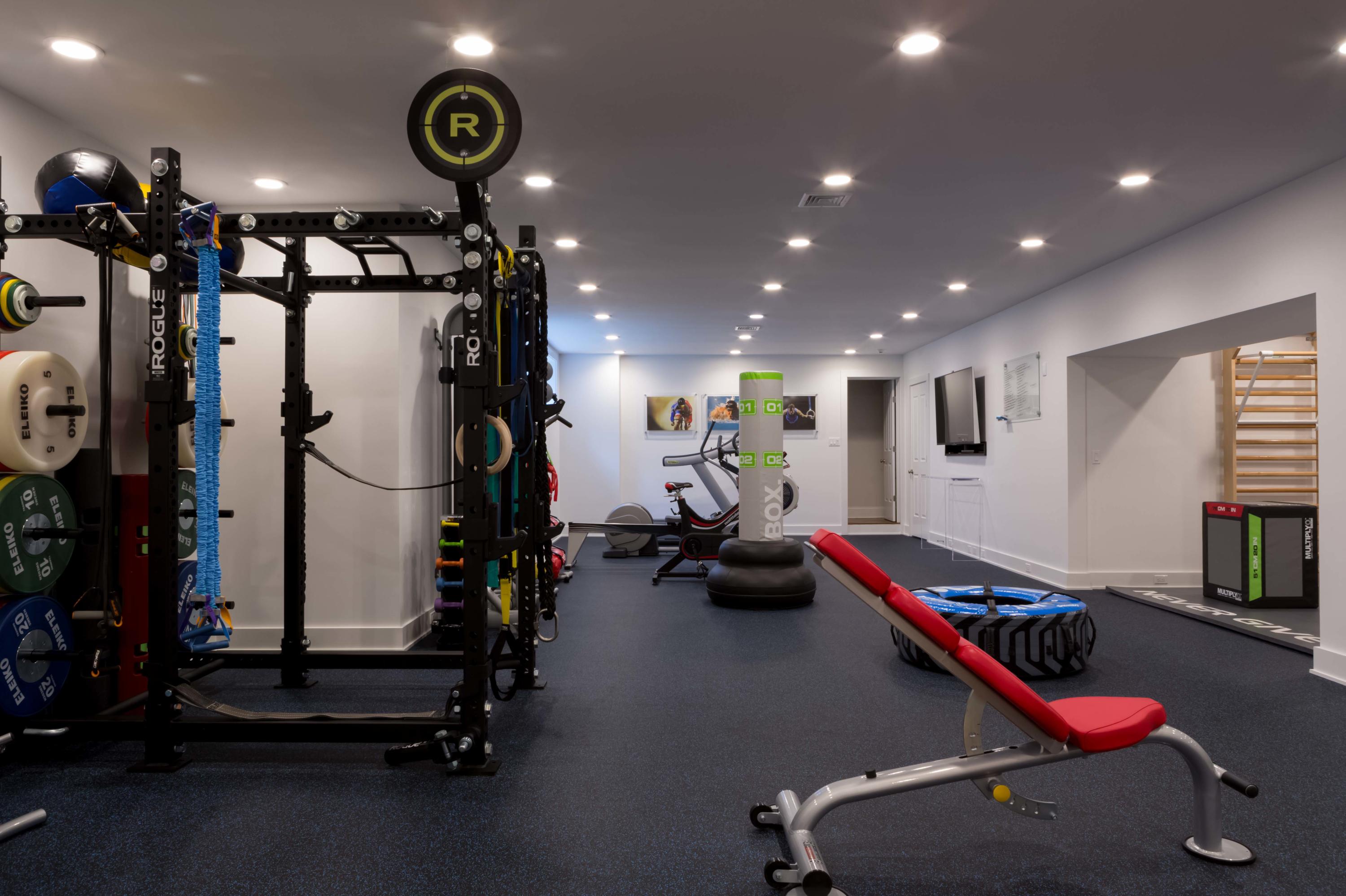 275 Middlesex Road Darien, CT 06820 - Photo 55 of 64 a room with gym equipment and gym equipment