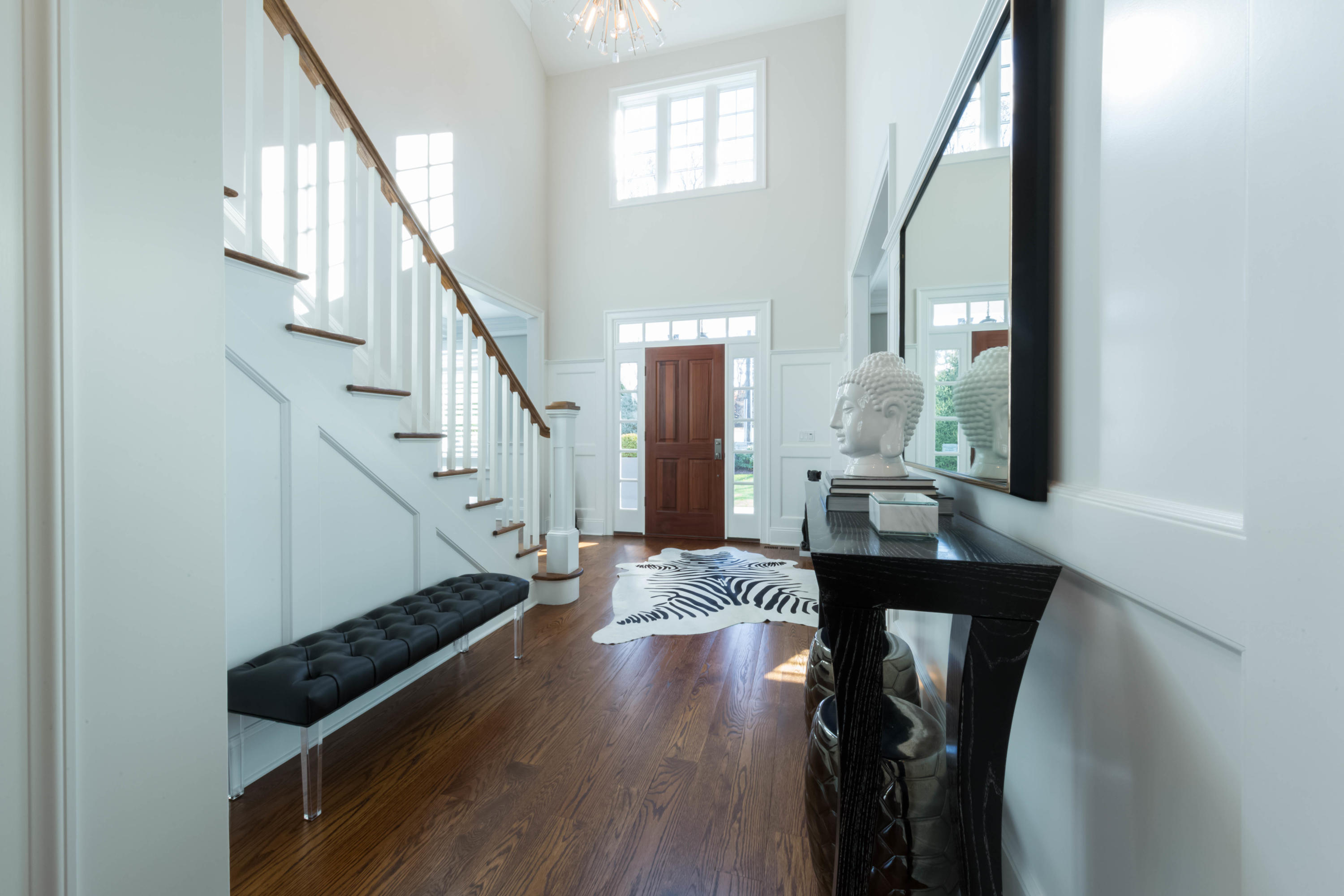 275 Middlesex Road Darien, CT 06820 - Photo 7 of 64 a view of entryway and hall with wooden floor