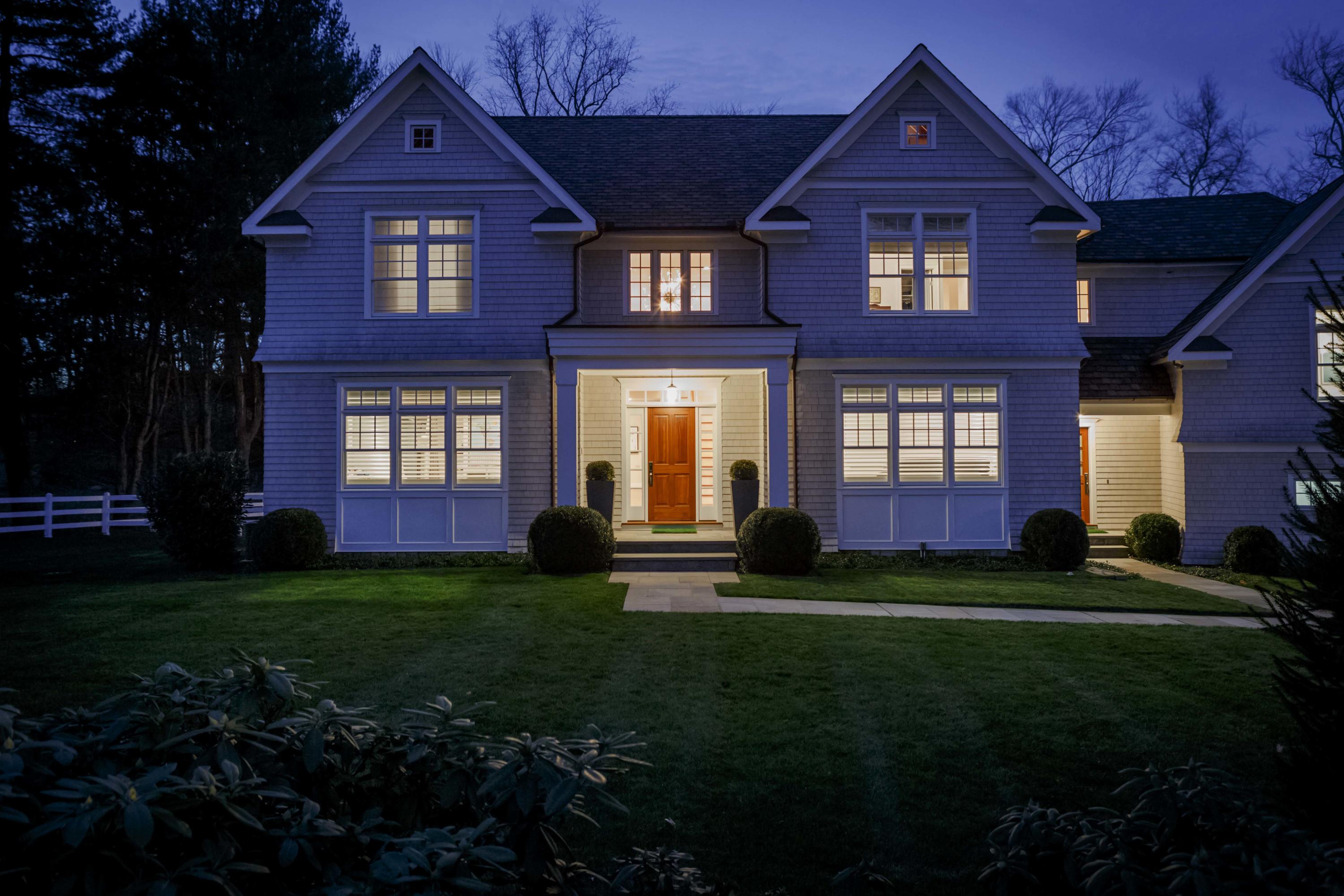 275 Middlesex Road Darien, CT 06820 - Photo 61 of 64 a front view of a house with a yard