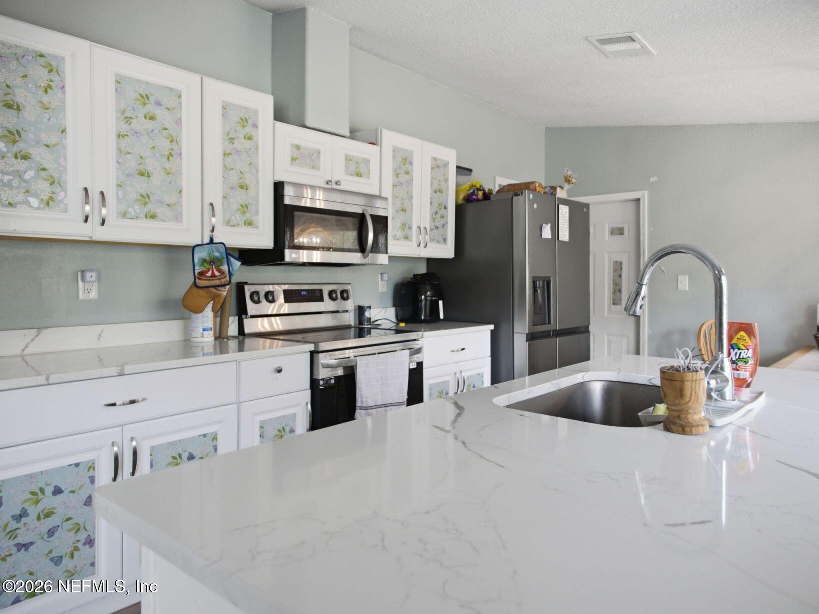 820 Selma Avenue Interlachen, FL 32148 - Photo 5 of 27 14-web-or-mls-P1039275