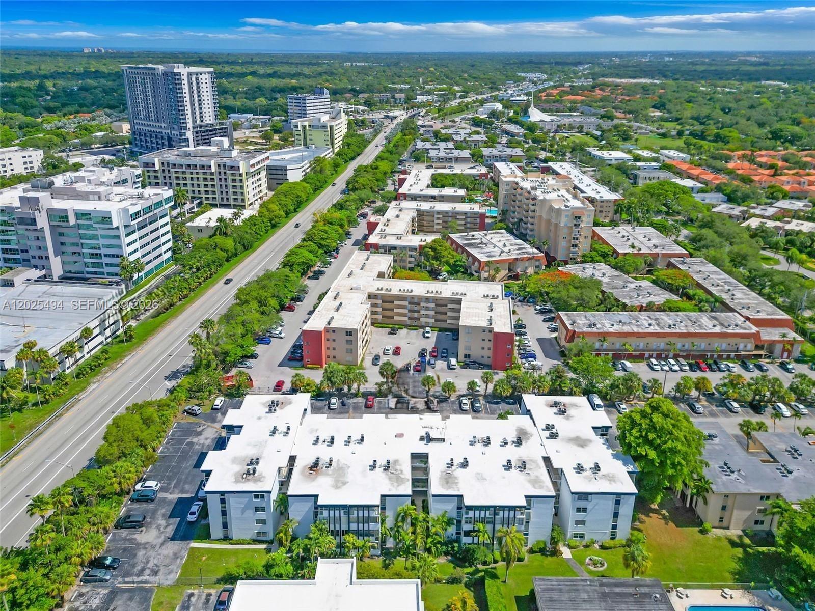9159 Southwest 77th Avenue, Unit 112 Miami, FL 33156 - Photo 38 of 38 a view of city with tall buildings