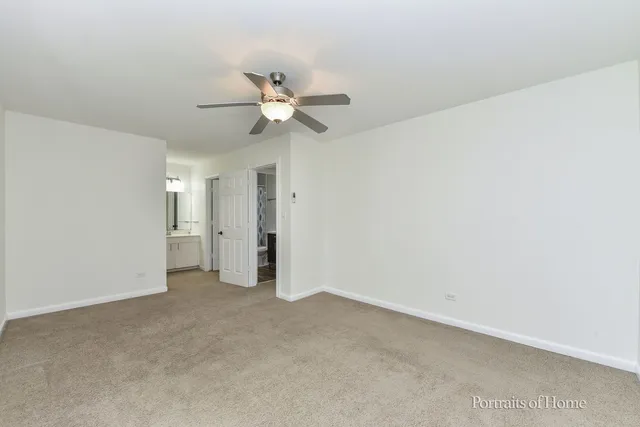 an empty room with a bathroom