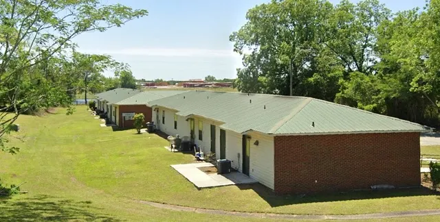 a view of a terrace with yard