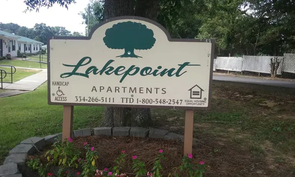 a view of a park that has sign board