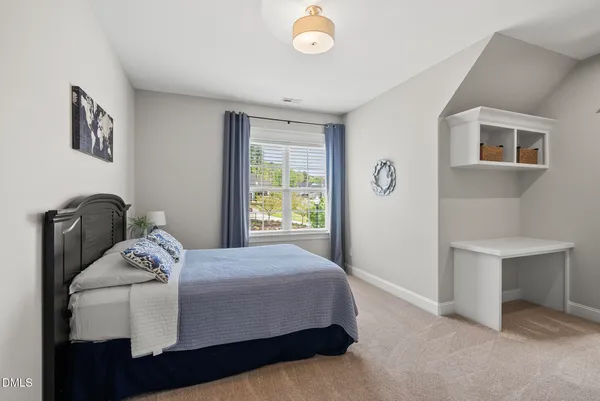 a view of room with toys and wooden floor