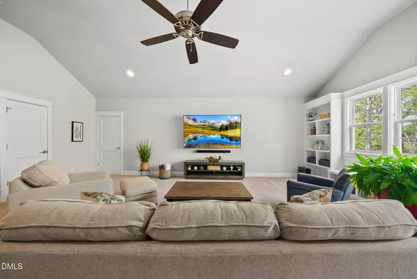 a view of a lake with couches