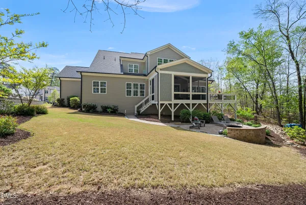 a view of a lake with couches