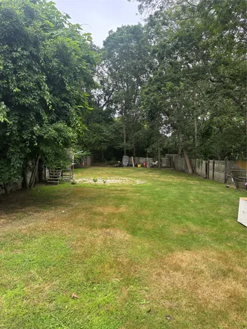 a kitchen with stainless steel appliances granite countertop a sink stove and microwave
