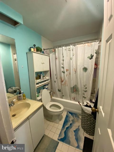 1825 T Street Northwest, Unit 201 Washington, DC 20009 - Photo 6 of 10 a bathroom with a granite countertop sink toilet and shower
