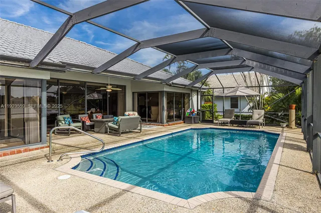 a view of a lake with houses in the background