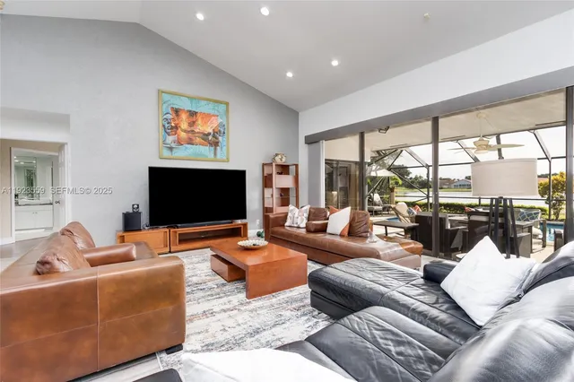 a kitchen with stainless steel appliances granite countertop a stove and a sink