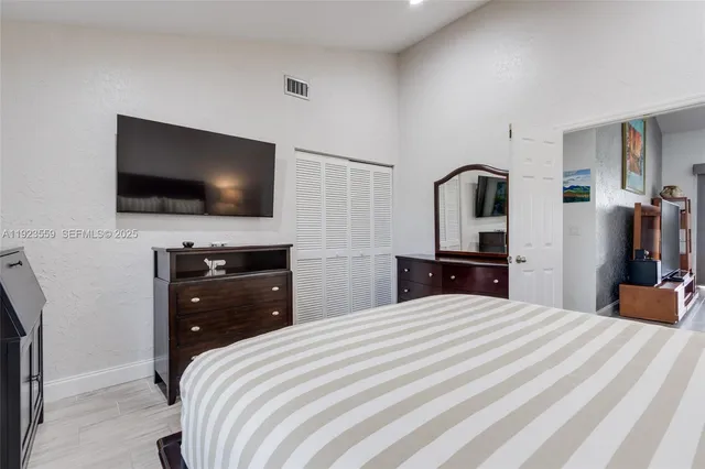 view of living room with furniture and floor to ceiling window