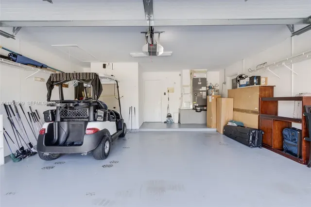 a view of a patio with swimming pool table and chairs