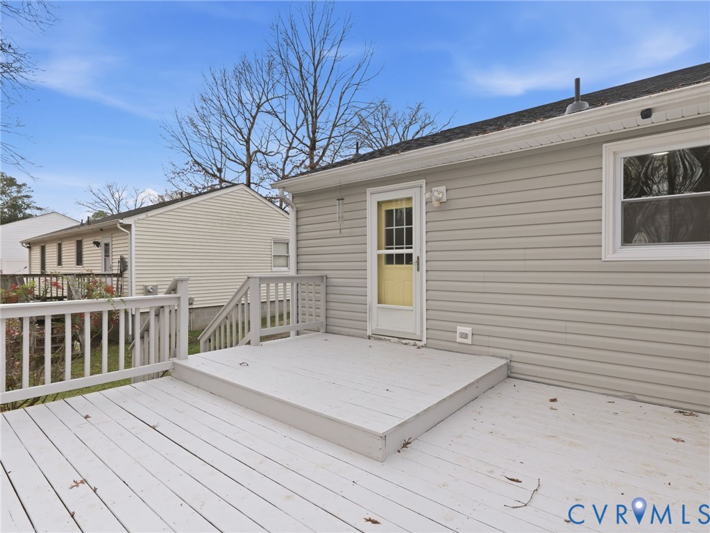 3626 Gilbert Street Hopewell, VA 23860 - Photo 18 of 20 a view of a house with a wooden deck