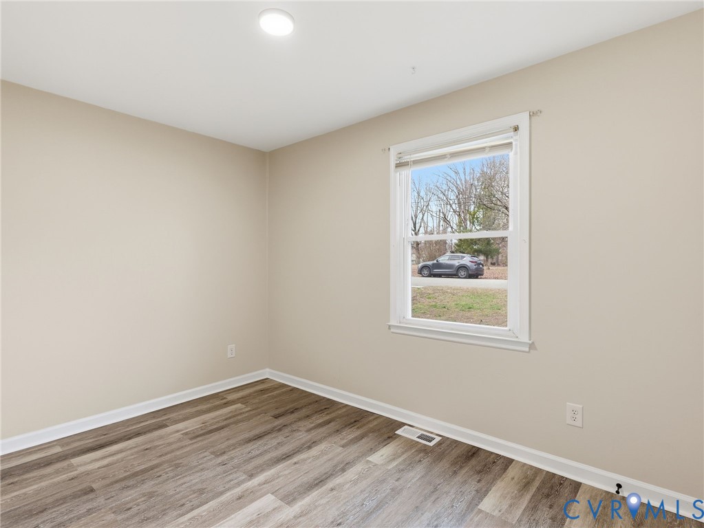 3626 Gilbert Street Hopewell, VA 23860 - Photo 10 of 20 an empty room with a window