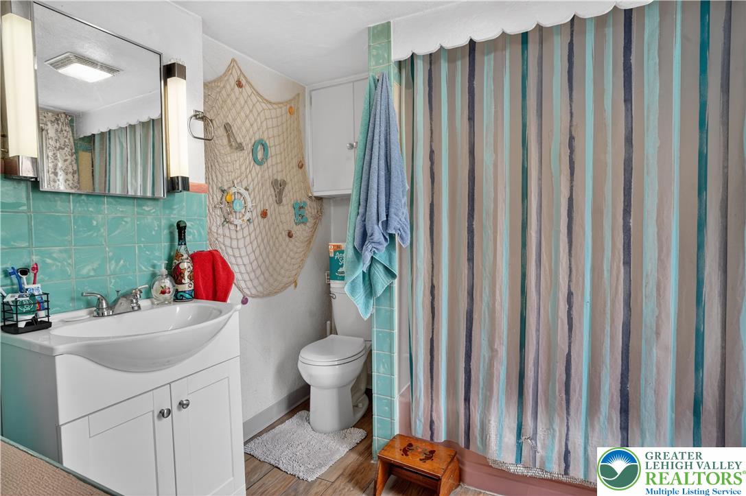 357 Main Road Lehighton, PA 18235 - Photo 27 of 38 a bathroom with a sink toilet and shower