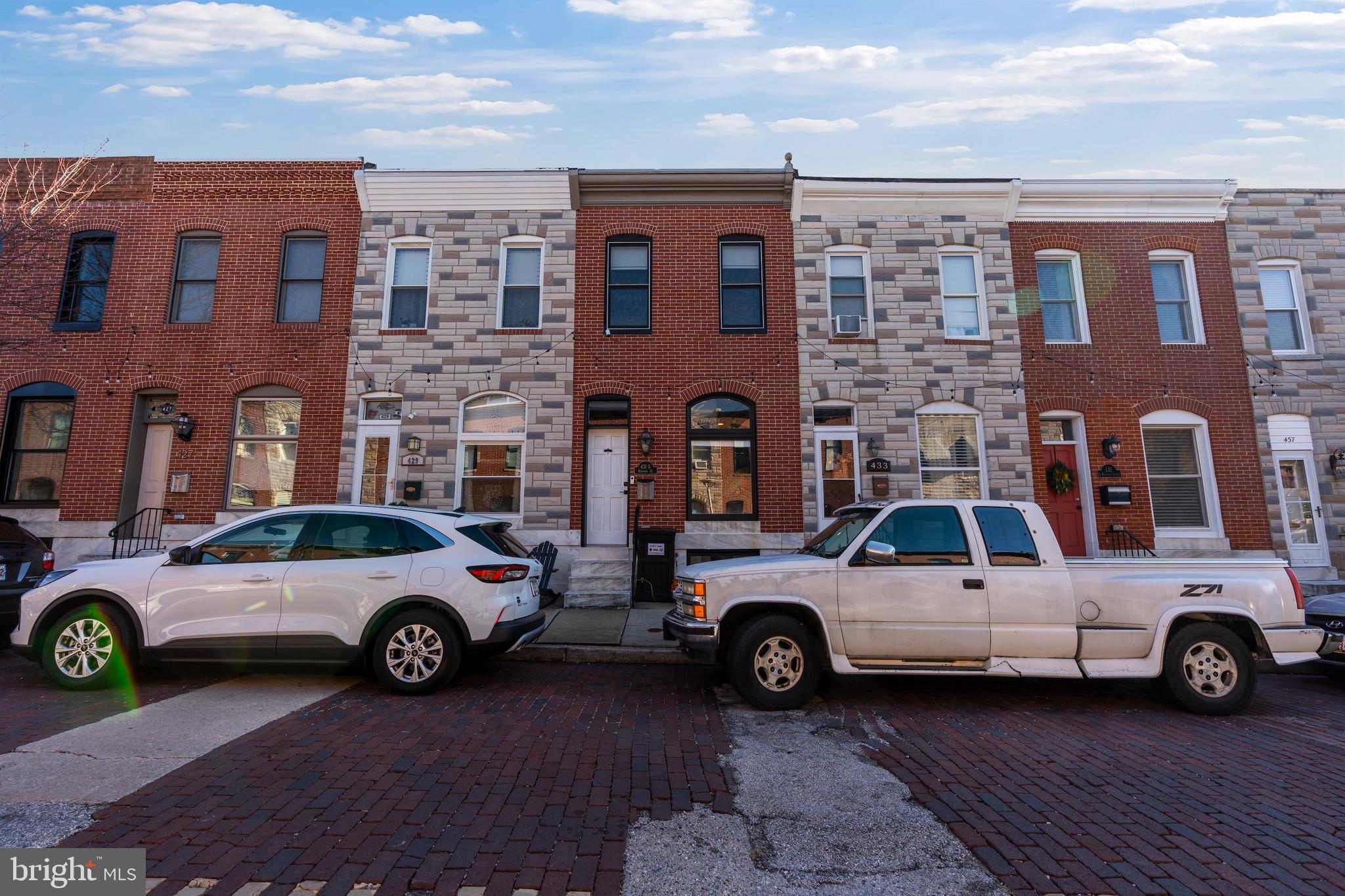 a view of a cars parked in front of a building