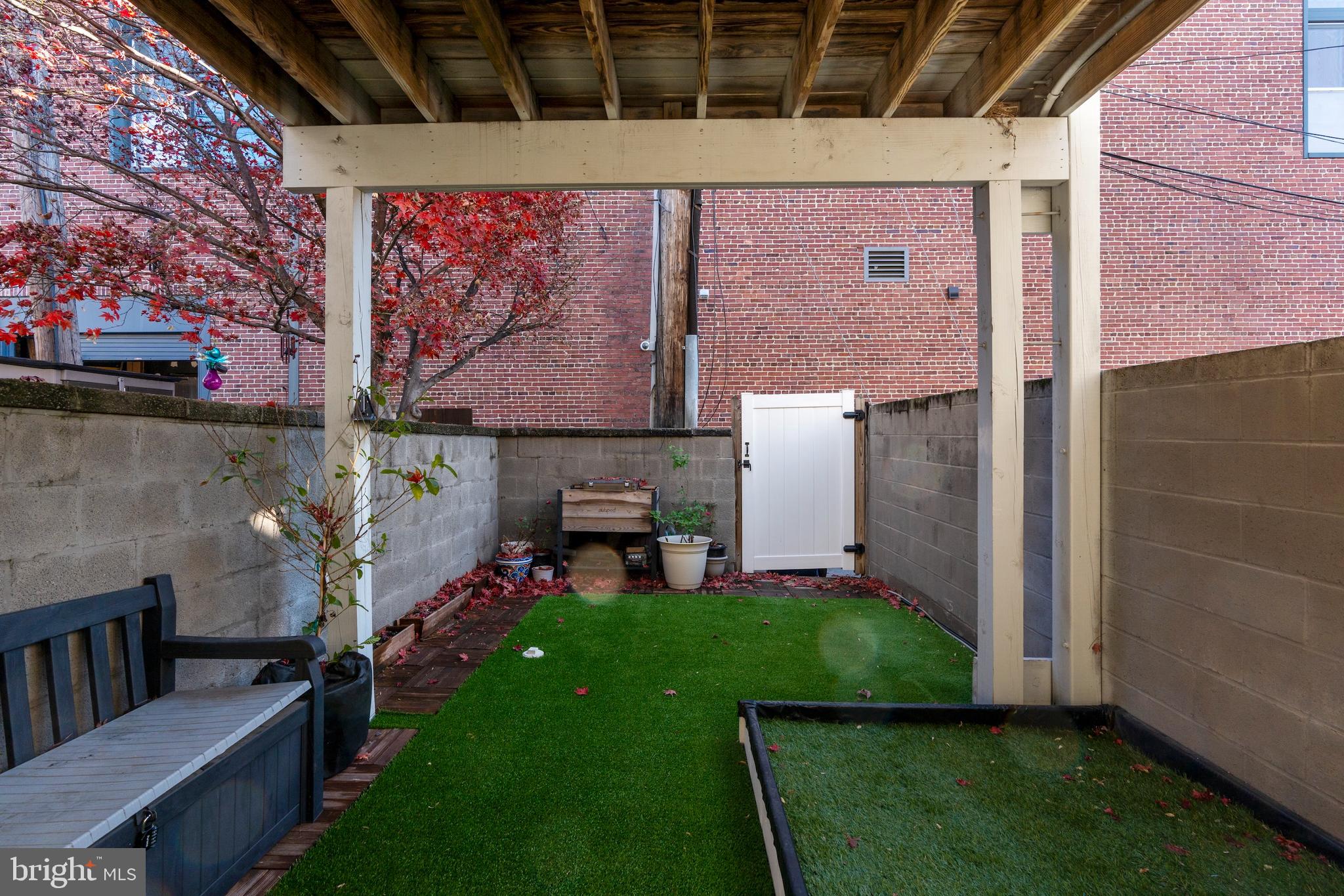 431 South Robinson Street Baltimore, MD 21224 - Photo 26 of 29 a view of yard with front door and porch