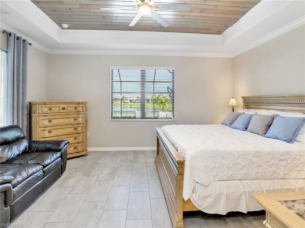 17528 Ashcomb Way Estero, FL 33928 - Photo 13 of 42 a bedroom with a bed and a window