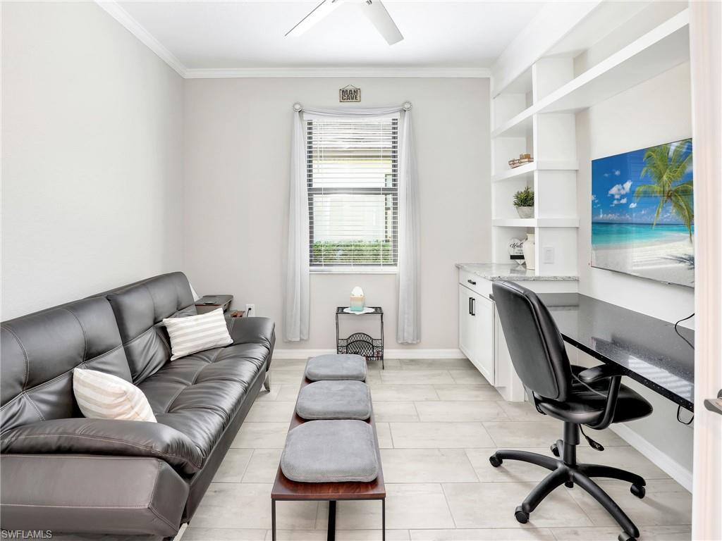 17528 Ashcomb Way Estero, FL 33928 - Photo 23 of 42 a living room with furniture and a window