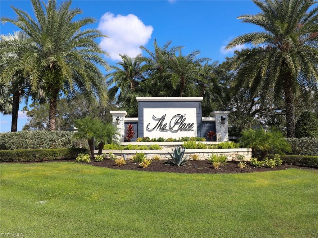 17528 Ashcomb Way Estero, FL 33928 - Photo 42 of 42 a front view of a house with garden