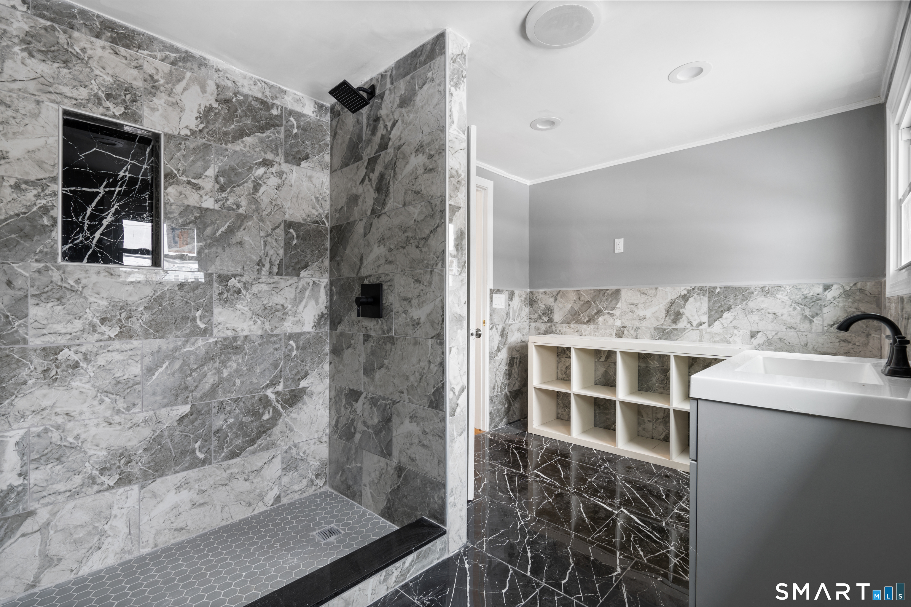 171 Foster Street Meriden, CT 06451 - Photo 12 of 35 a bathroom with a shower and a sink