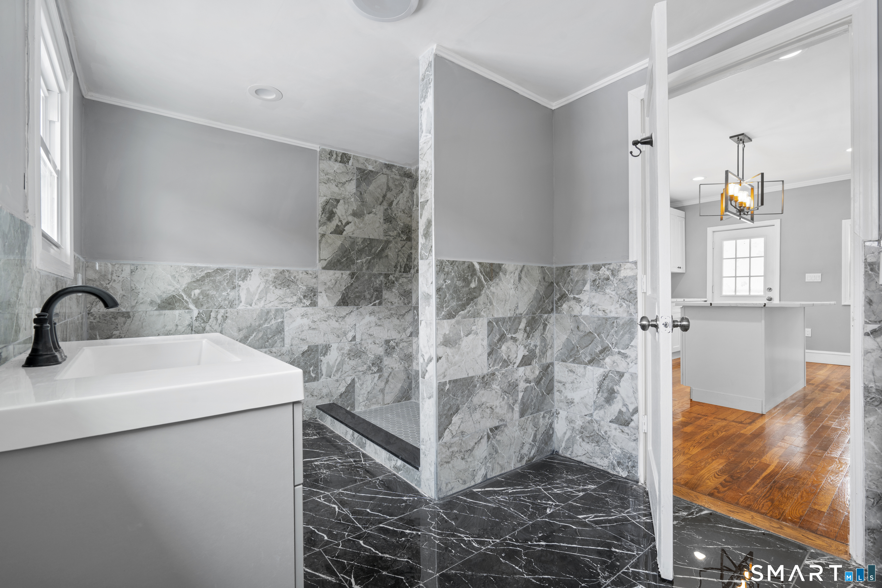 171 Foster Street Meriden, CT 06451 - Photo 13 of 35 a bathroom with a sink and a mirror