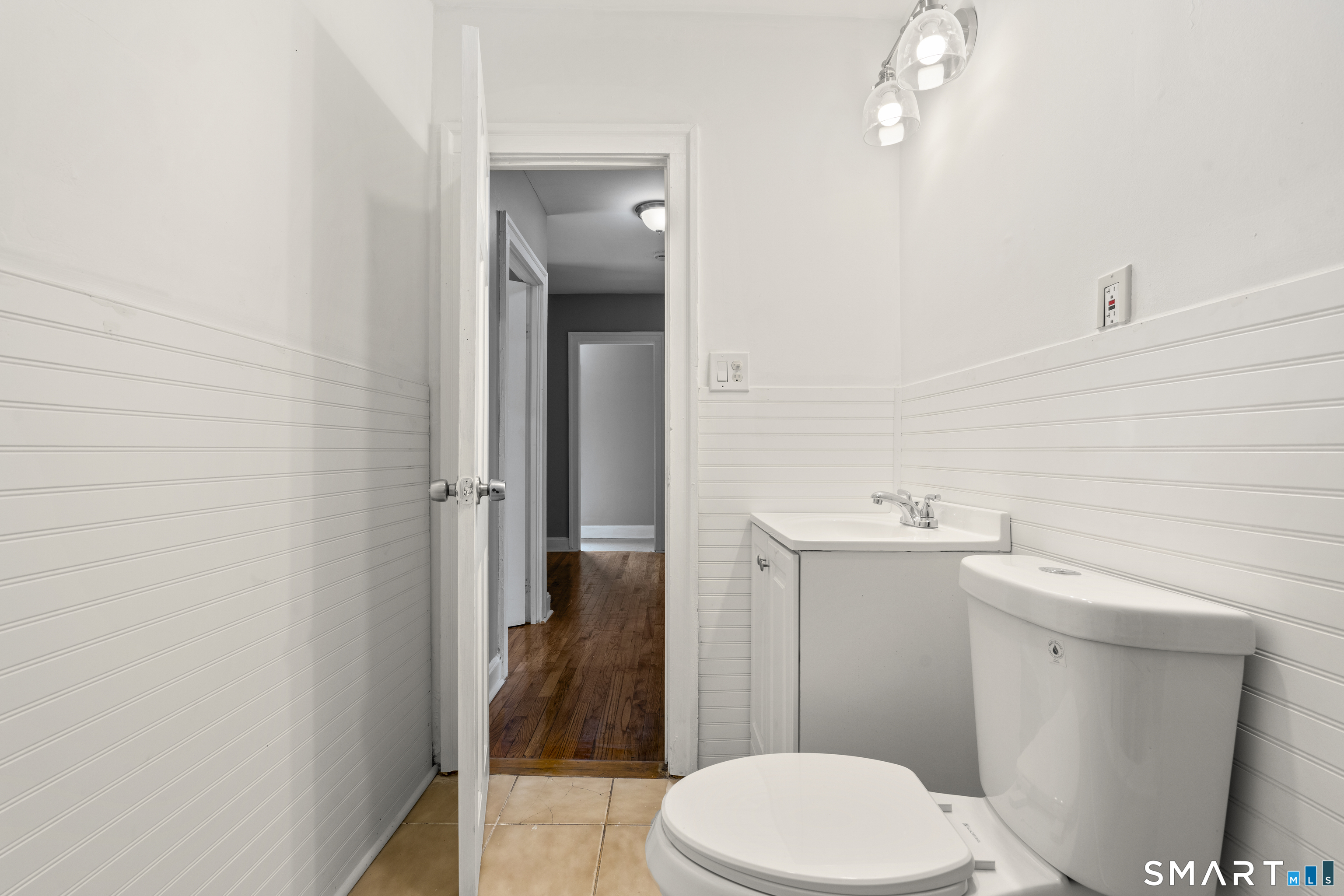 171 Foster Street Meriden, CT 06451 - Photo 24 of 35 a bathroom with a toilet a sink and shower