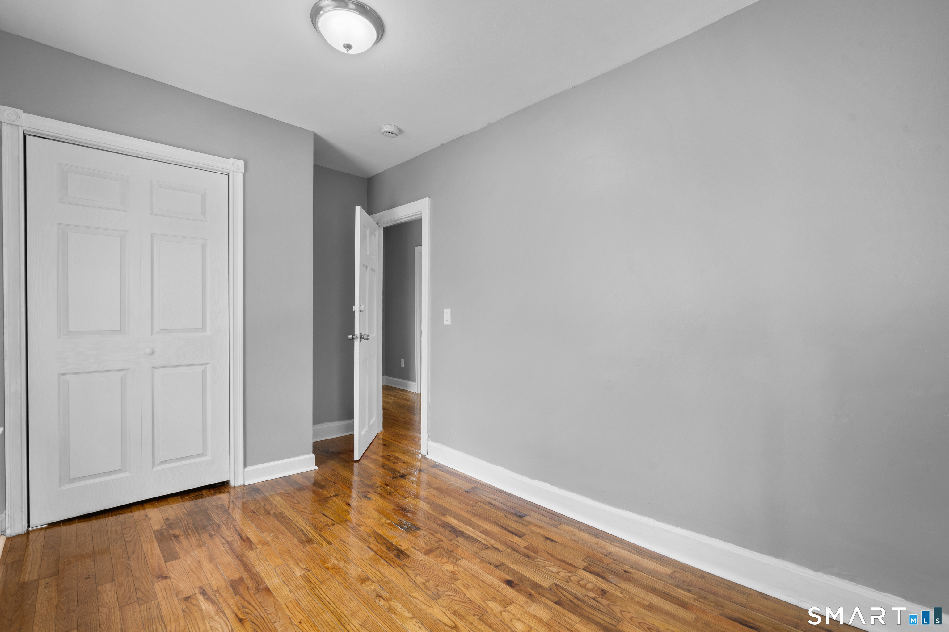 171 Foster Street Meriden, CT 06451 - Photo 31 of 35 a view of an empty room and wooden floor