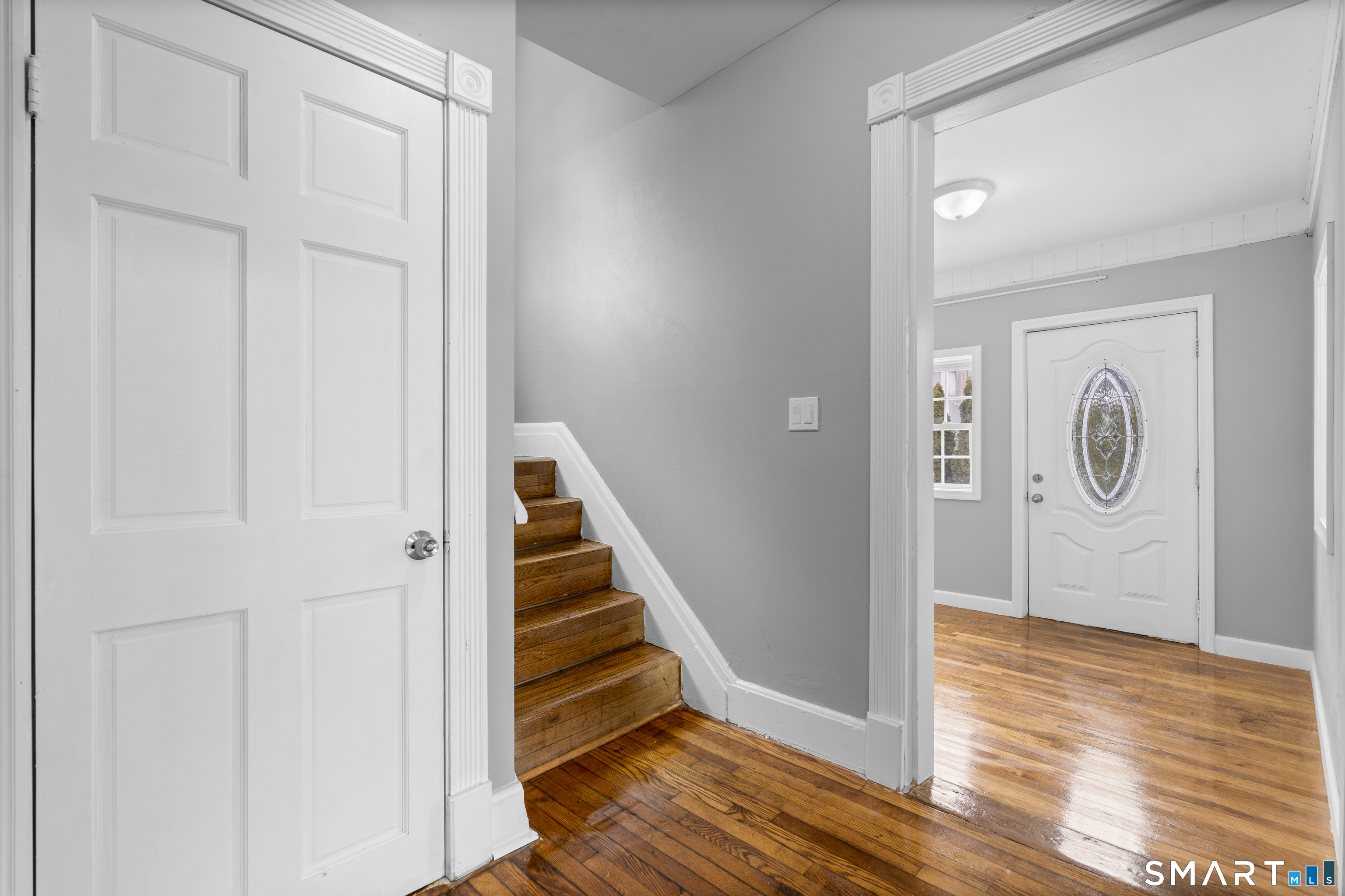 171 Foster Street Meriden, CT 06451 - Photo 9 of 35 a view of a hallway with wooden floor