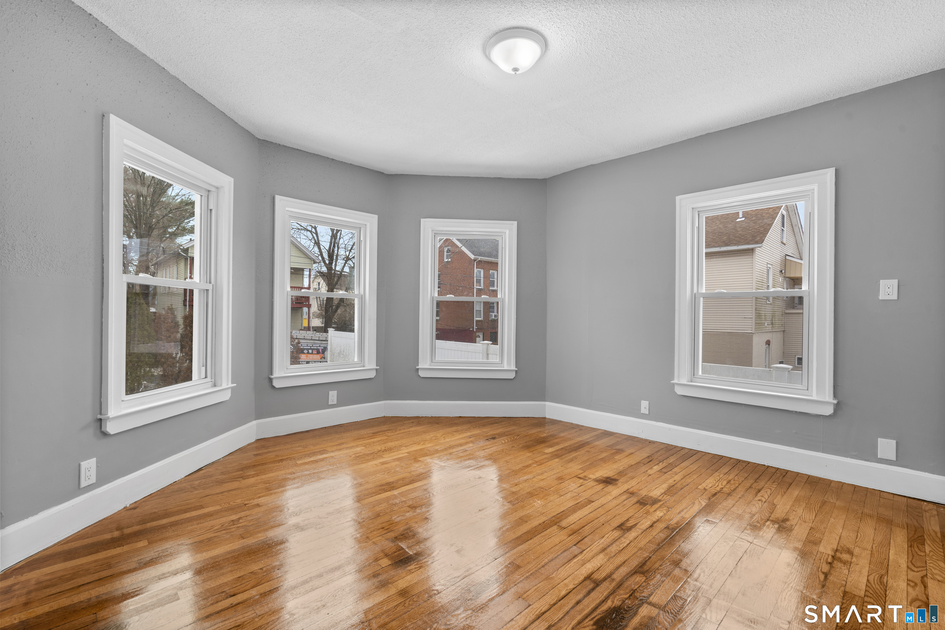 171 Foster Street Meriden, CT 06451 - Photo 10 of 35 a view of an empty room with a window