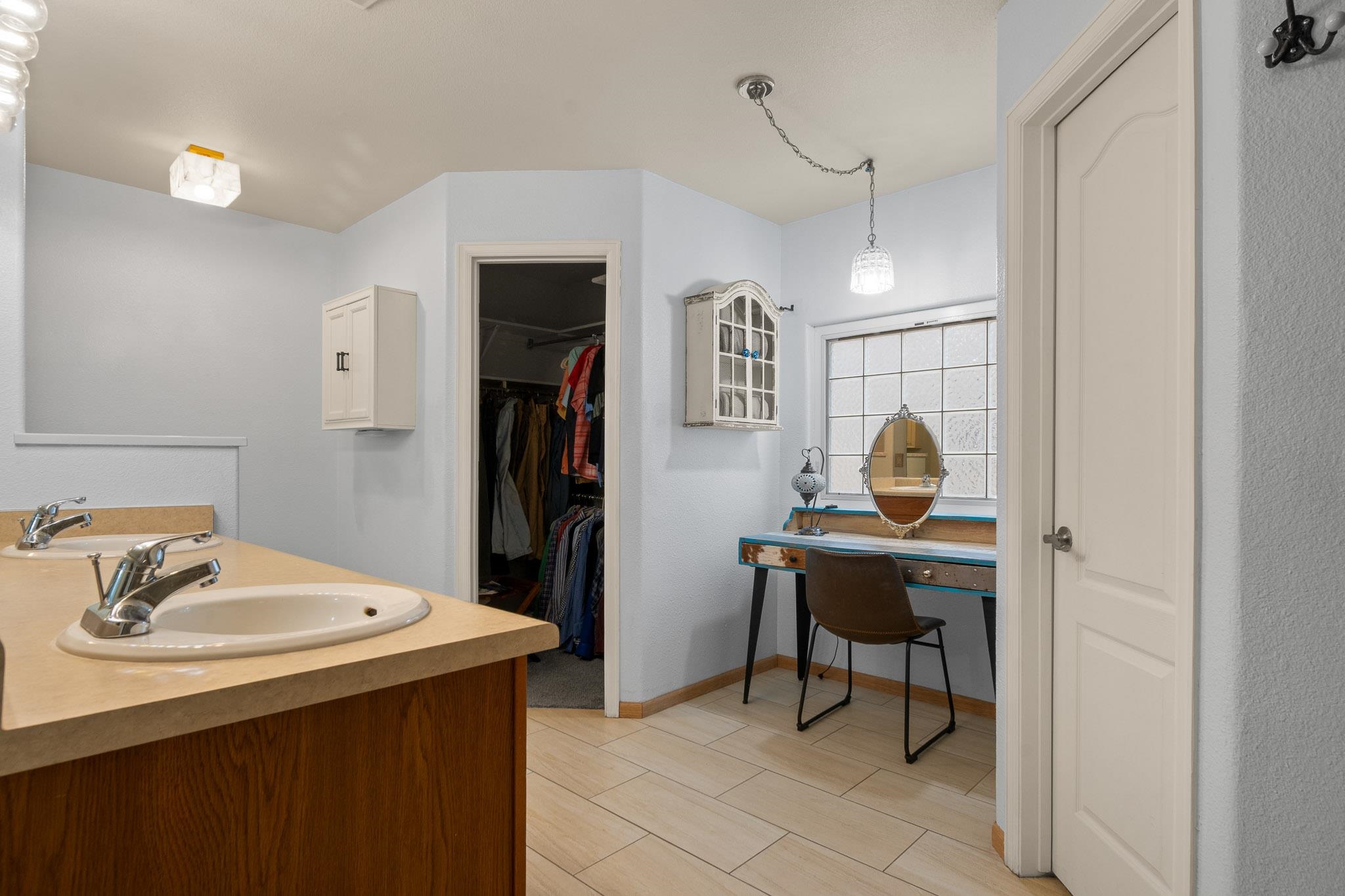 398 Butte Court Grand Junction, CO 81507 - Photo 14 of 33 a room with a table chairs and a sink
