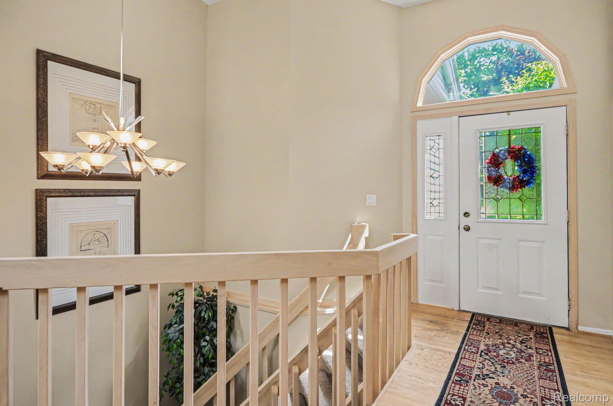 6638 Ridgeview Drive Clarkston, MI 48346 - Photo 4 of 28 Foyer and open to stairs to lower level