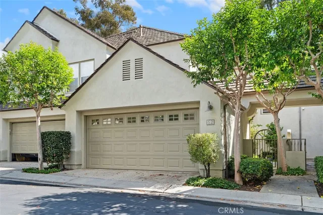 a view of a house with a garage