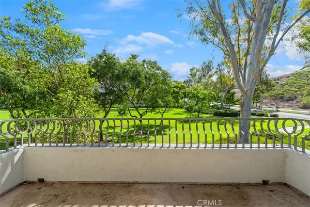 a view of swimming pool with a yard