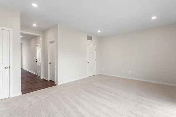 a view of a lake in front of a building